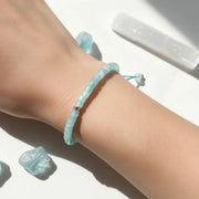 Woman wearing an aqua stone adjustable beaded bracelet