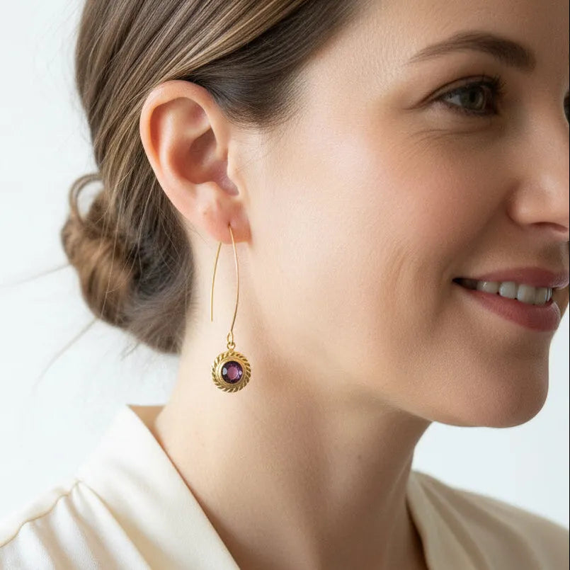 Woman wearing Amethyst Halo drop earrings on long ear wires