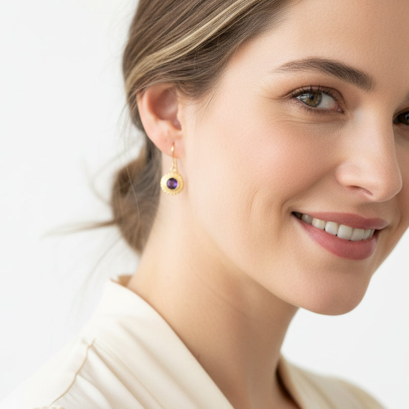 Woman wearing Amethyst Halo drop earrings on shepherd's hook wires