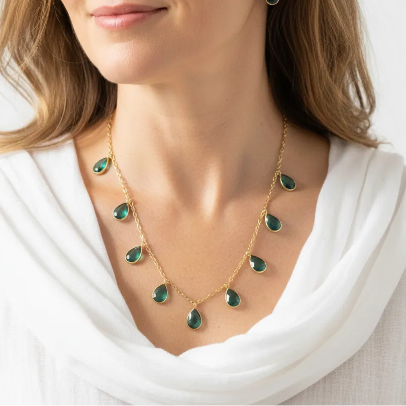 Woman wearing an apatite gemstone chain necklace, throat chakra jewelry
