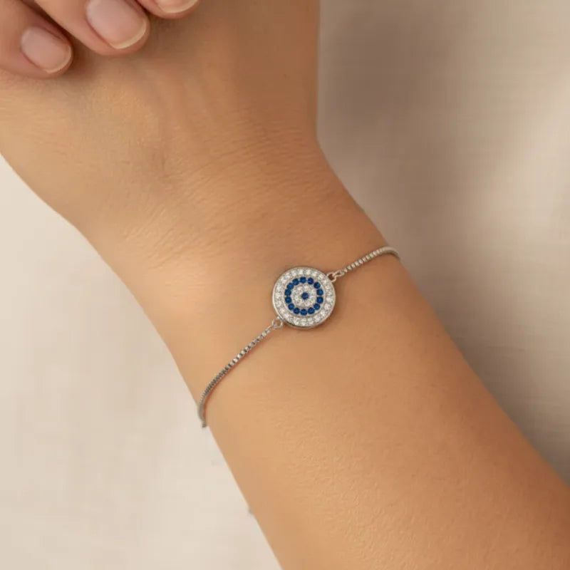 Adjustable evil eye bracelet with celestial charms, protection symbol jewelry