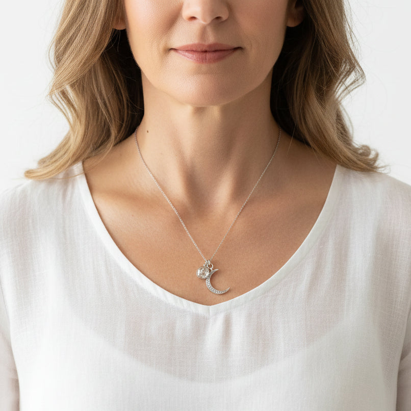 Silver crescent moon crystal ball pendant necklace — celestial jewelry for intuition