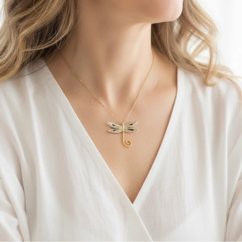 Woman wearing a sterling silver dragonfly necklace, spirit animal jewelry