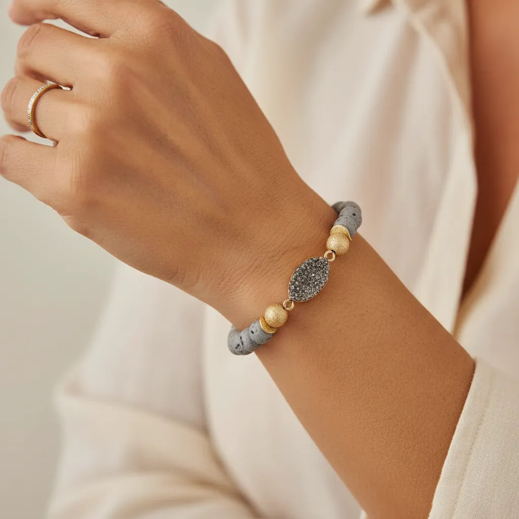 Woman wearing a grey druzy stretch bracelet