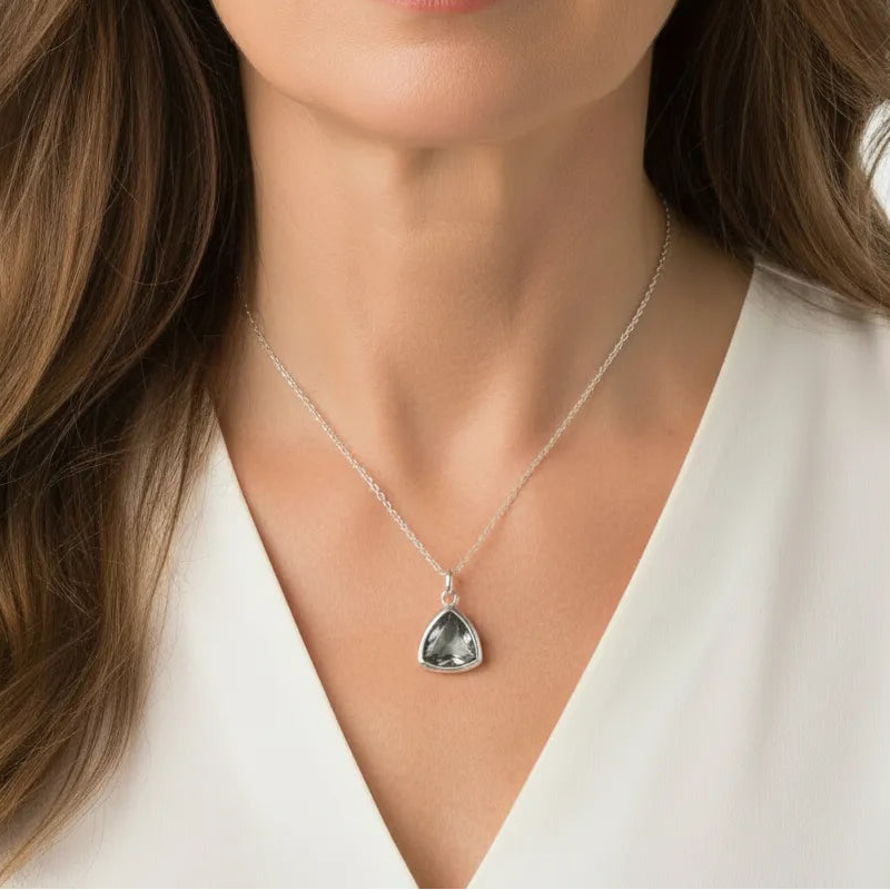 Woman wearing a silver dusk athena chain necklace — celestial jewelry for calm