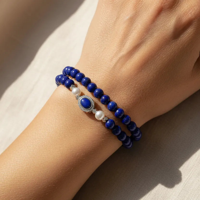 Woman wearing stacked lapis lazuli stretch bracelets, throat chakra jewelry