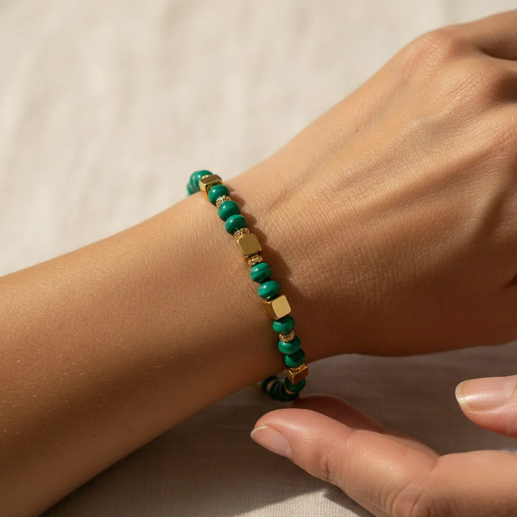 Woman wearing a malachite beaded bracelet
