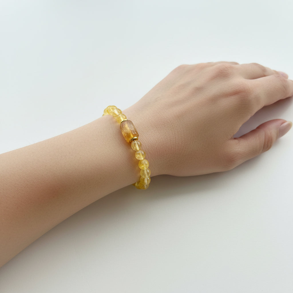 Natural citrine stretch bracelet close detail in warm honey gold — November birthstone jewelry