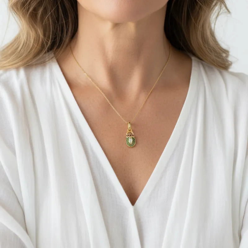 Woman wearing a scarab pendant necklace, spirit animal jewelry