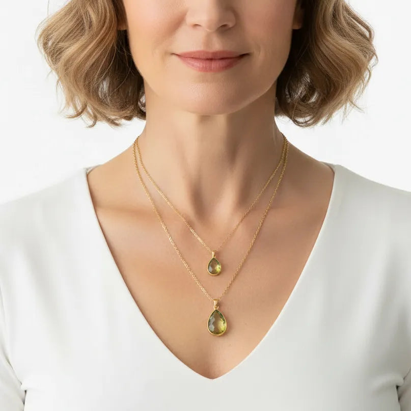 Woman wearing Tropical Aura mini and regular drop necklaces