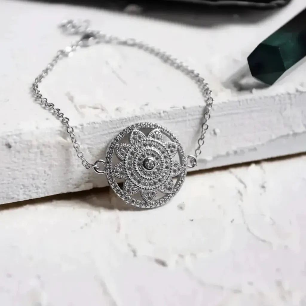 Silver mandala charm bracelet with a beaded band