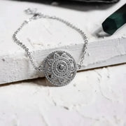 Silver mandala charm bracelet with a beaded band