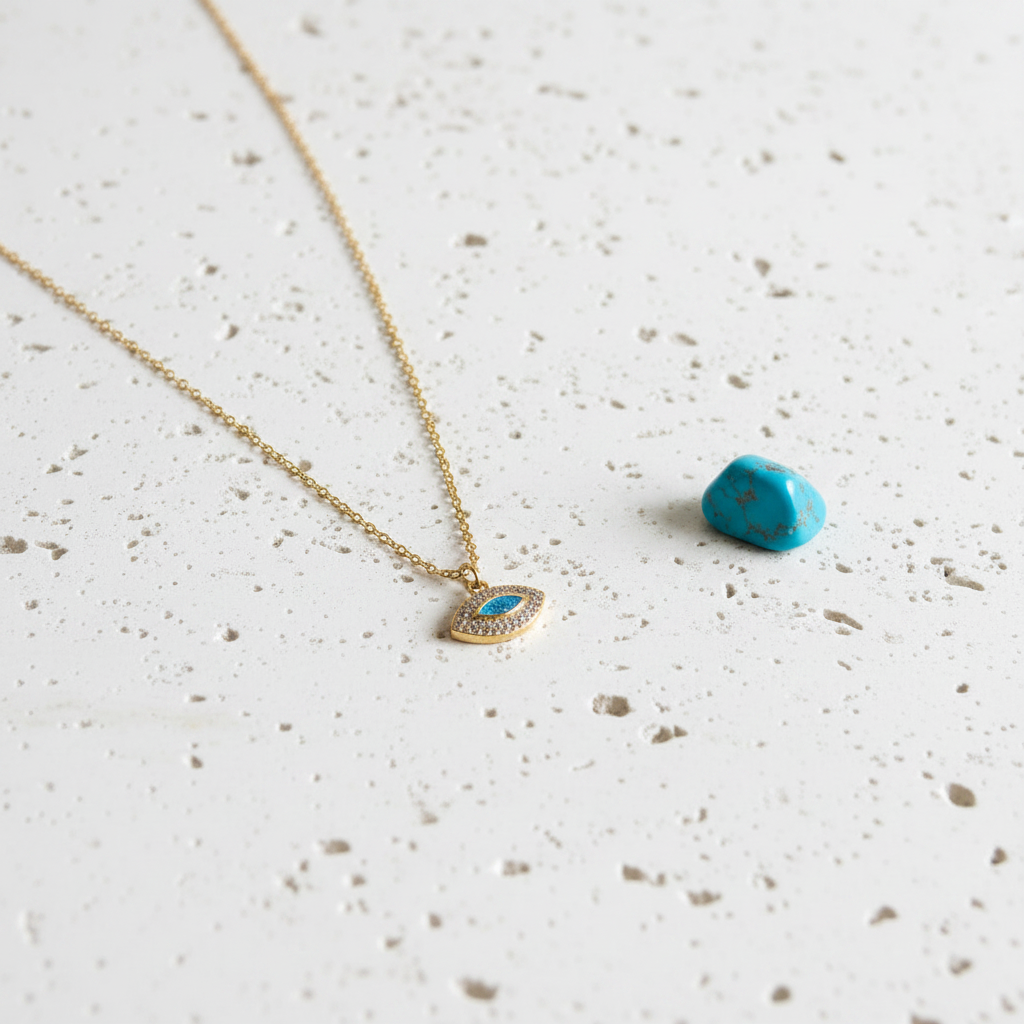 Gold plated marquise evil eye pendant necklace with faux opal centre and pave crystal surround