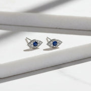 Sterling silver mini evil eye stud earrings with a blue CZ centre