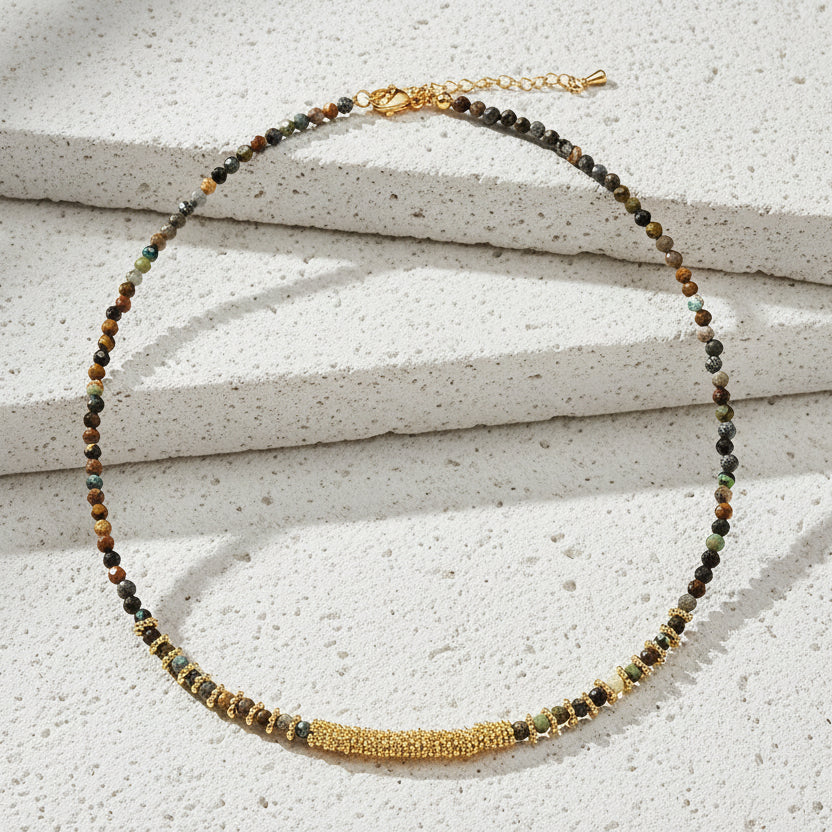 Handmade semi-precious stone beaded choker necklaces in chakra colours — turquoise, black, brown, green  