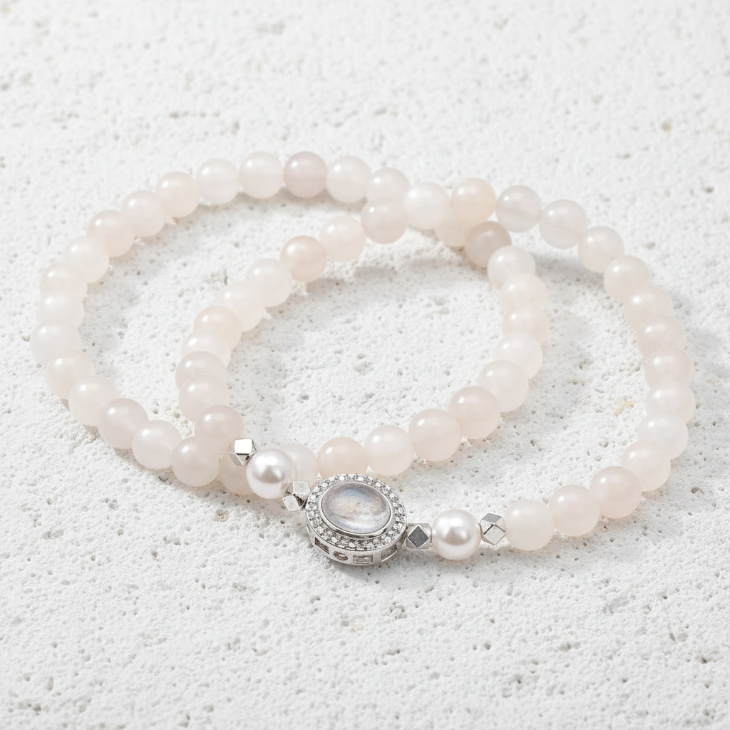 Set of pearl bracelets with a silver clasp on a white background