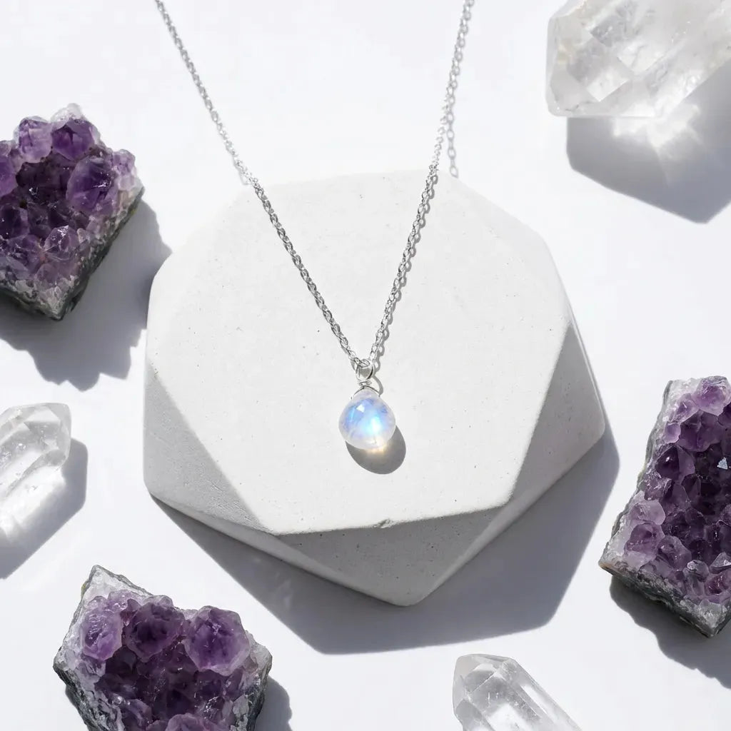 Moonstone Crown Chakra pendant necklace for intuition and divine connection, styled with crystals