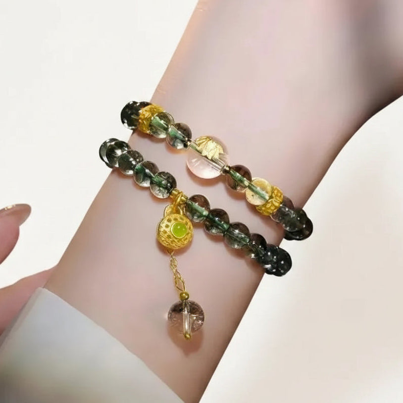 Moss agate double wrap mala bracelet on the wrist — heart chakra jewelry for grounding