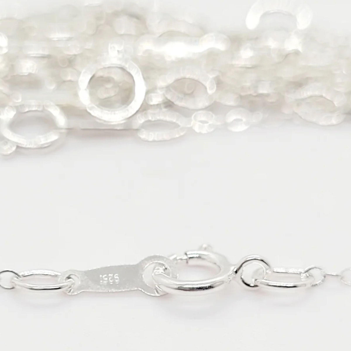 Close up of sterling silver cable chain clasp showing the 925 quality stamp