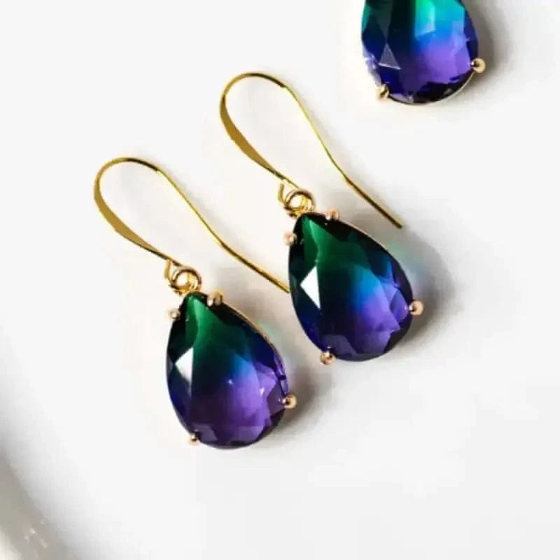 Ombre Drop Peacock Earrings featuring purple and green Aura Gemstones in elegant gold settings.