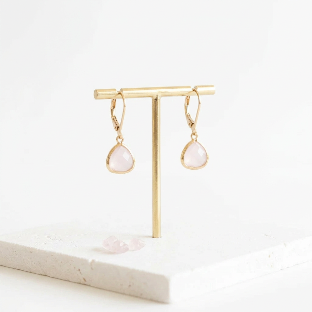 Gold Petite Pebble leverback earrings in opalite glass, opal-inspired shimmer, hanging view