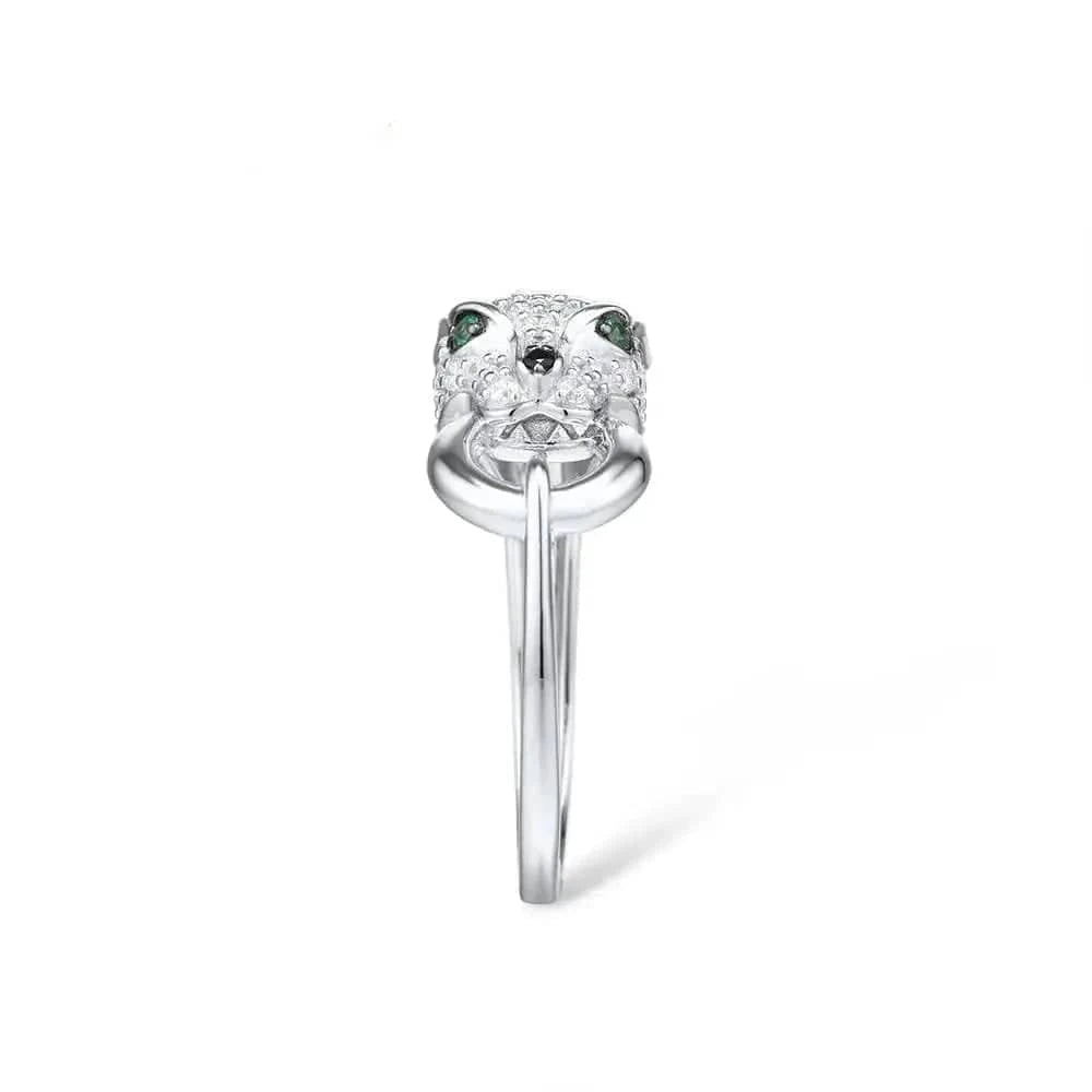 Silver ring with green gemstones on a white background, featuring the brand 'Santuzza'.