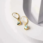 shell earrings in gold