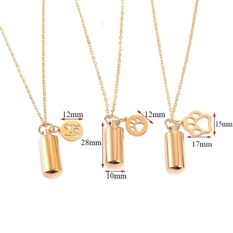 Gold necklaces with cylindrical pendants and paw charm, showing measurements on a white background.