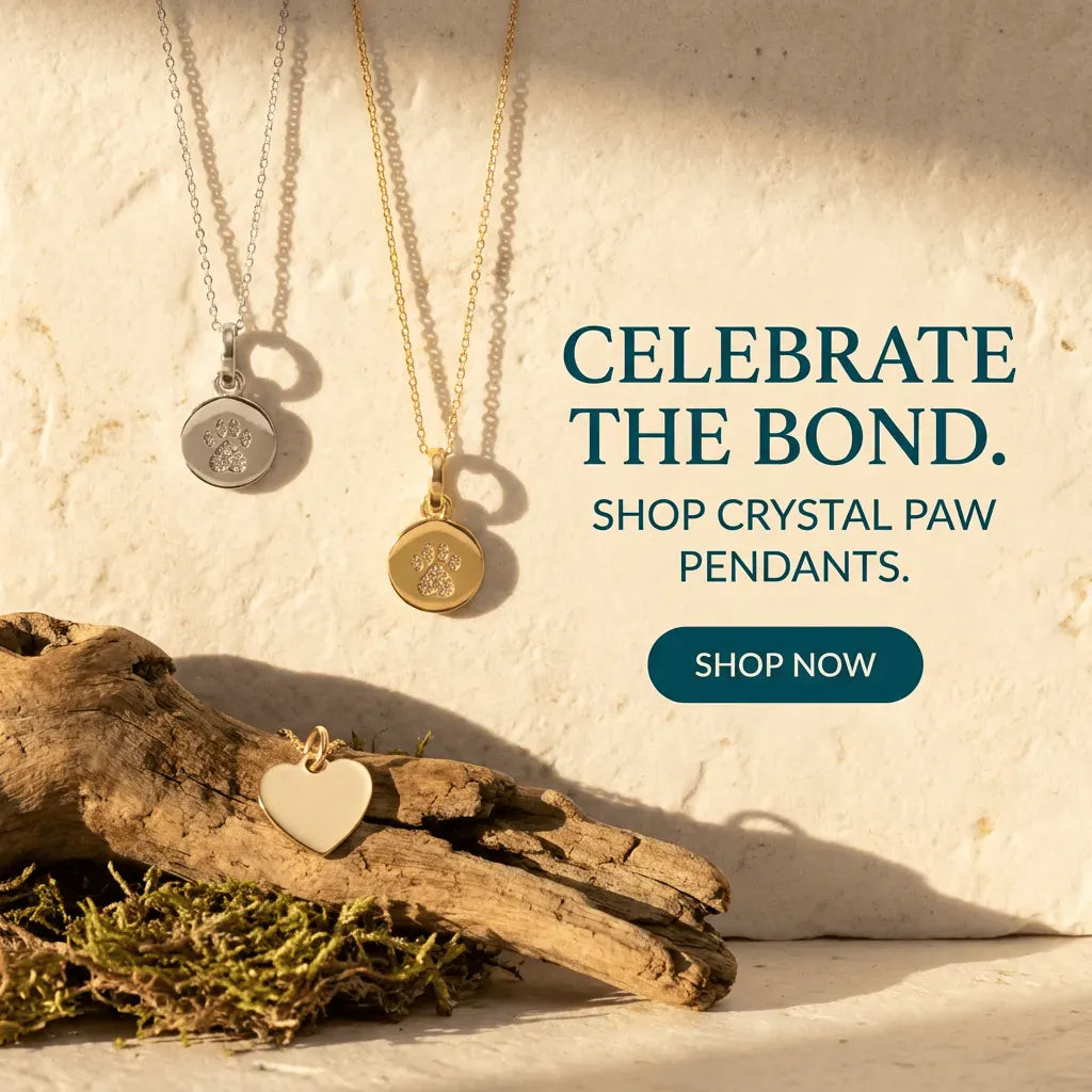 Three necklaces with pendants on a stone surface, with text encouraging shopping for crystal paw pendants.