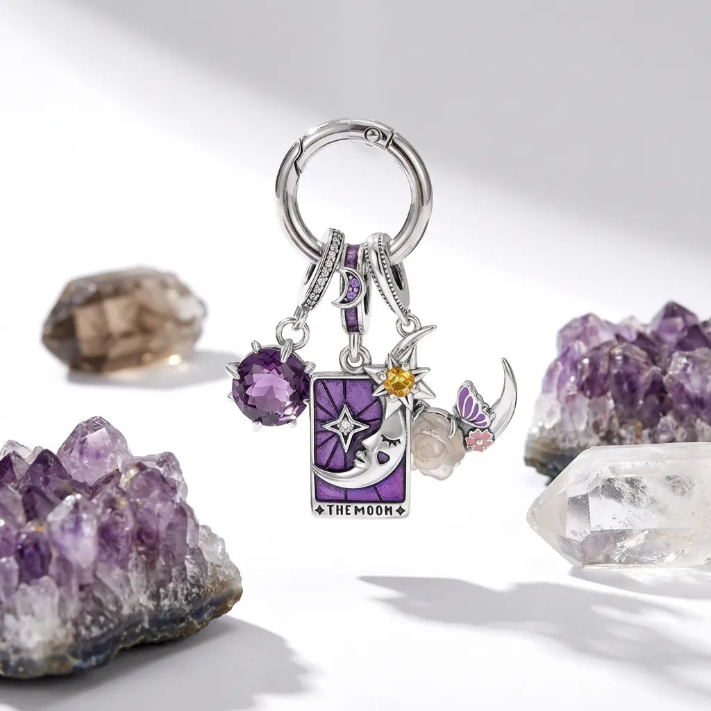 Keychain with celestial charms on a white background with crystals
