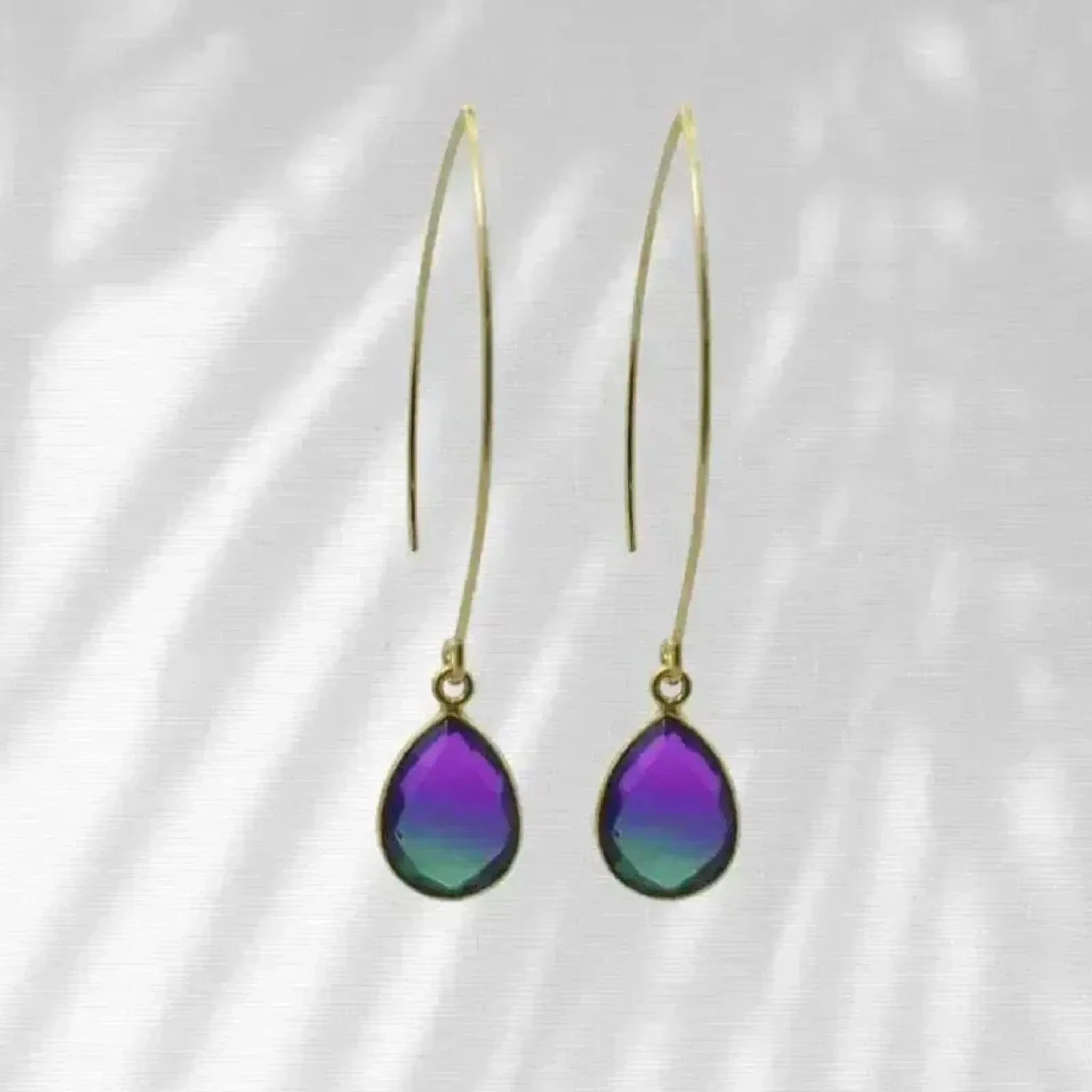 peacock aura gold earrings