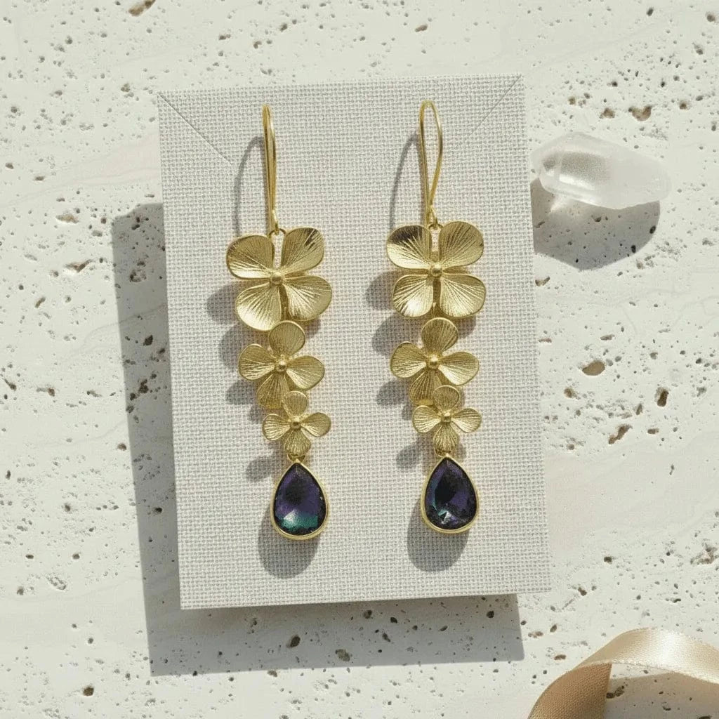 Peacock ombré plumeria cascade earrings in gold with purple-green drops