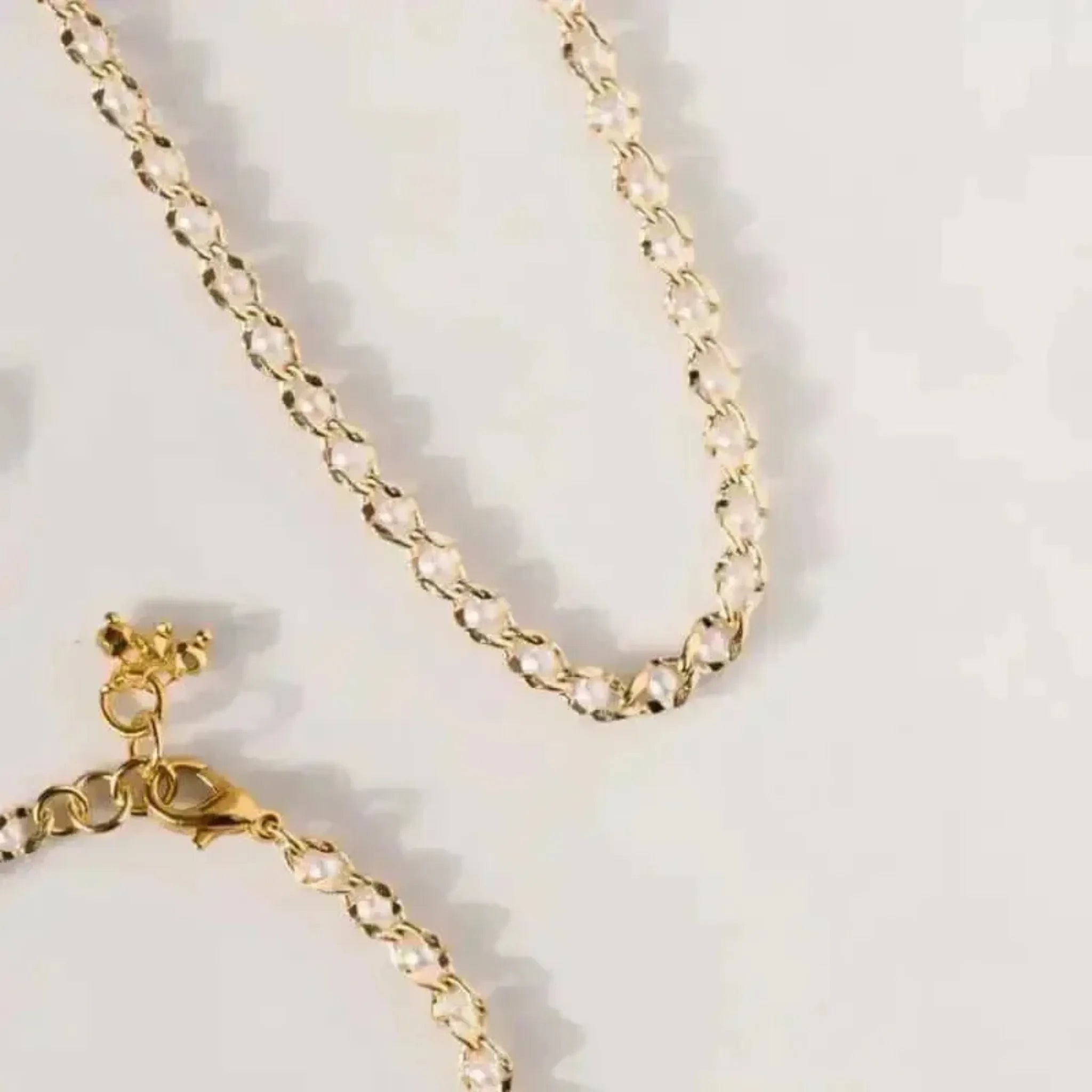 pearl and gold chain necklace and bracelet set