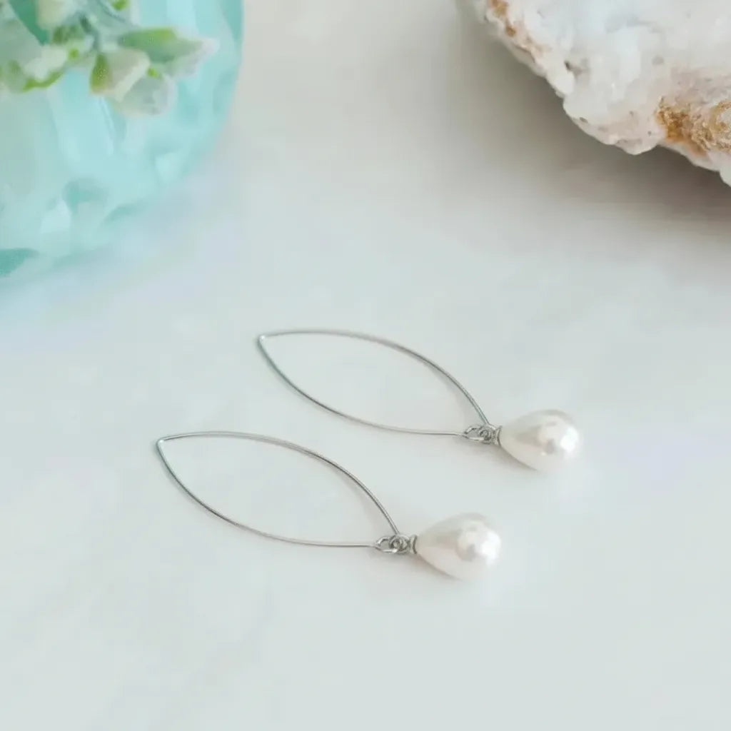 Gold pearl drop earrings with long hook earwires, June birthstone jewelry