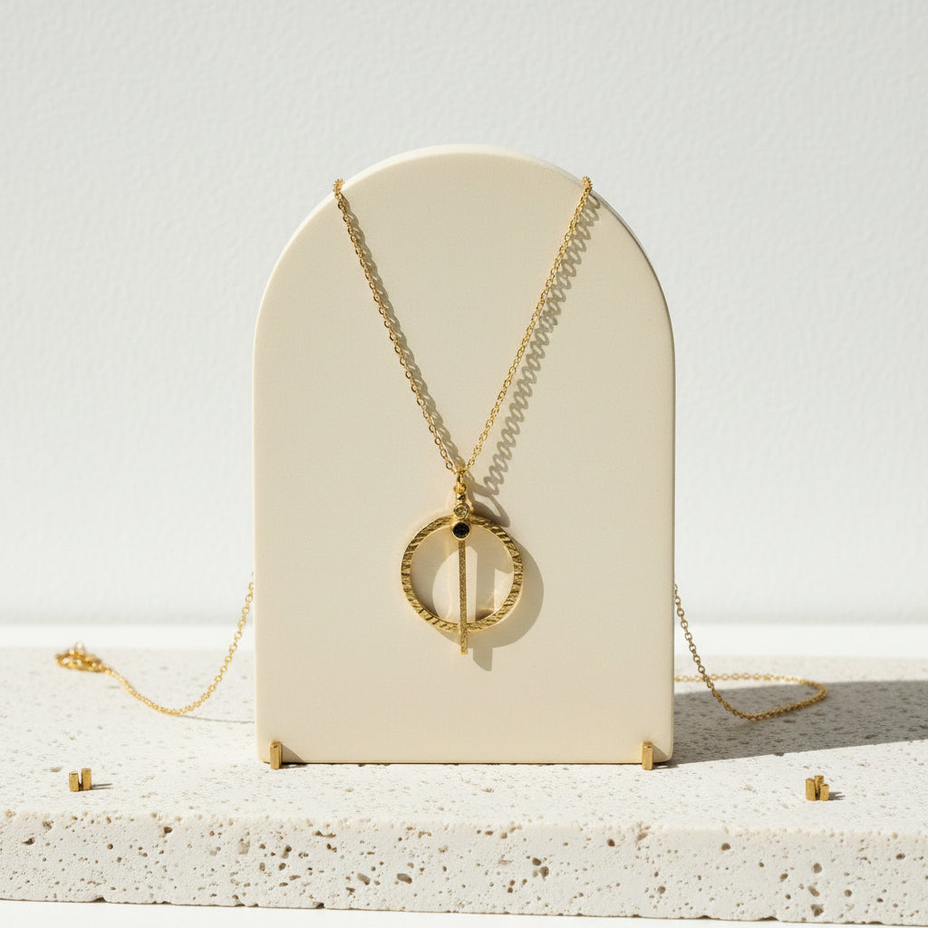 Hammered gold medallion necklace set with natural peridot — August birthstone jewelry
