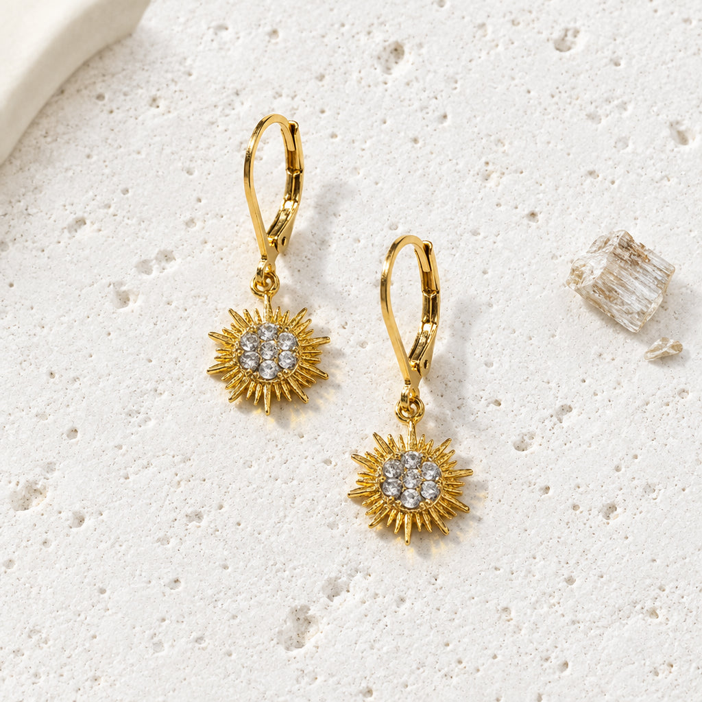 Gold plated petite sun drop earrings with a seven-stone CZ cluster centre on leverbacks