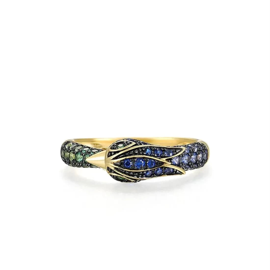 Gold ring with green and blue gemstones on a white background