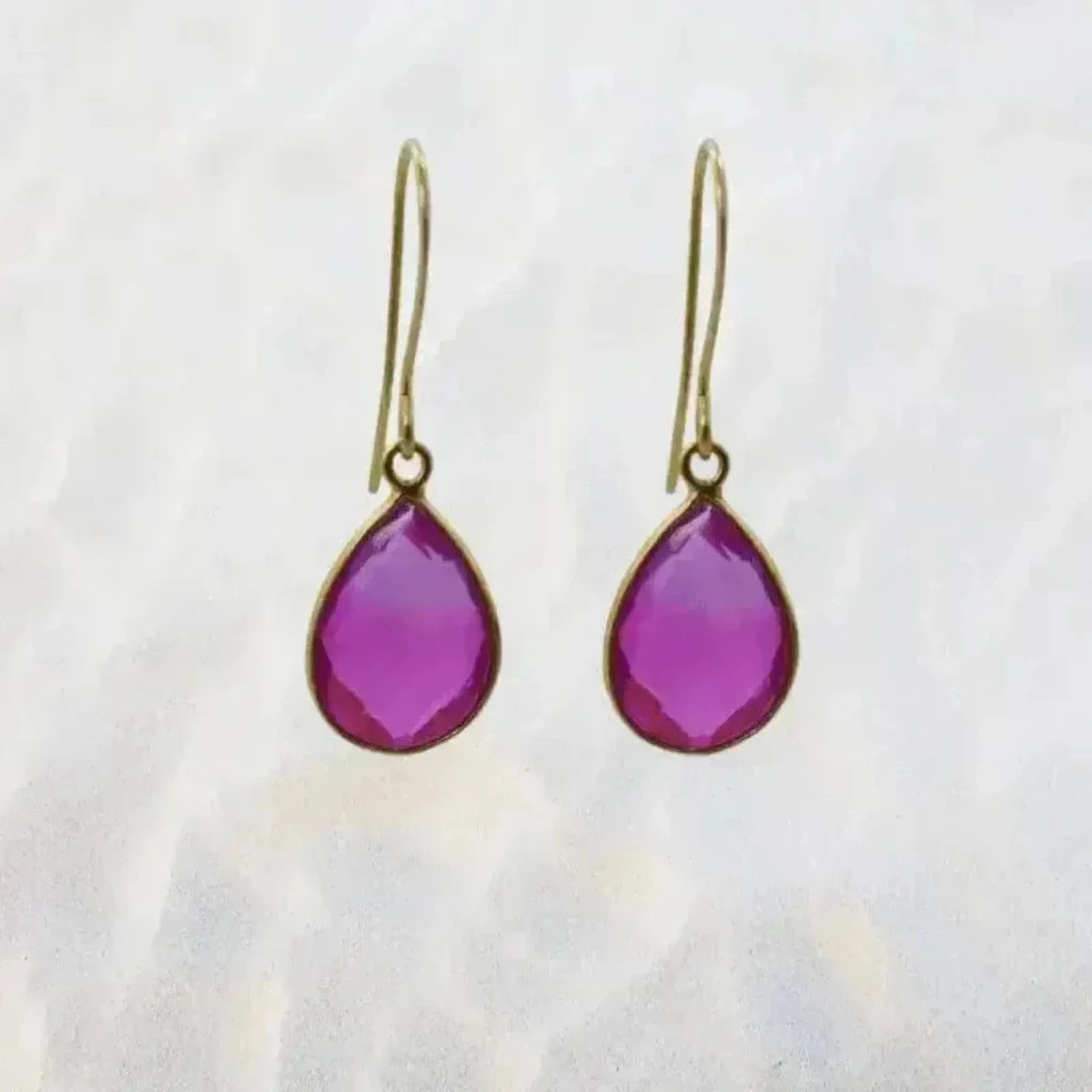 pink aura earrings in gold