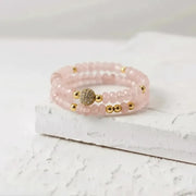 Pink rose quartz stretch bracelets stacked — heart chakra jewelry for love and compassion