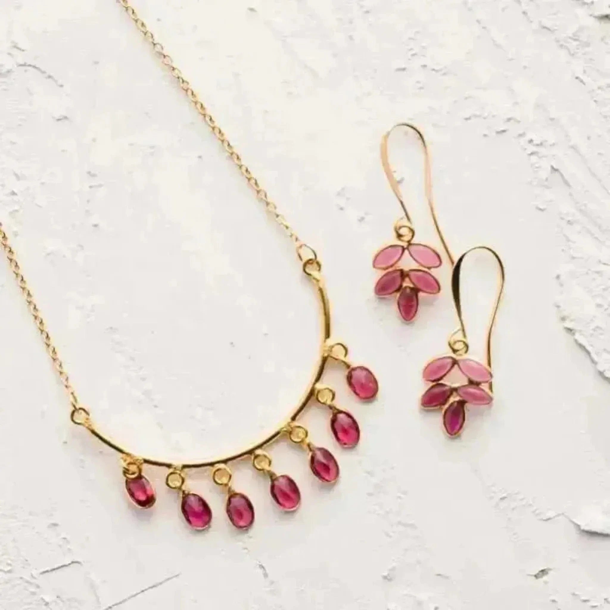 pink tourmaline necklace and earring set in red and gold color pallet