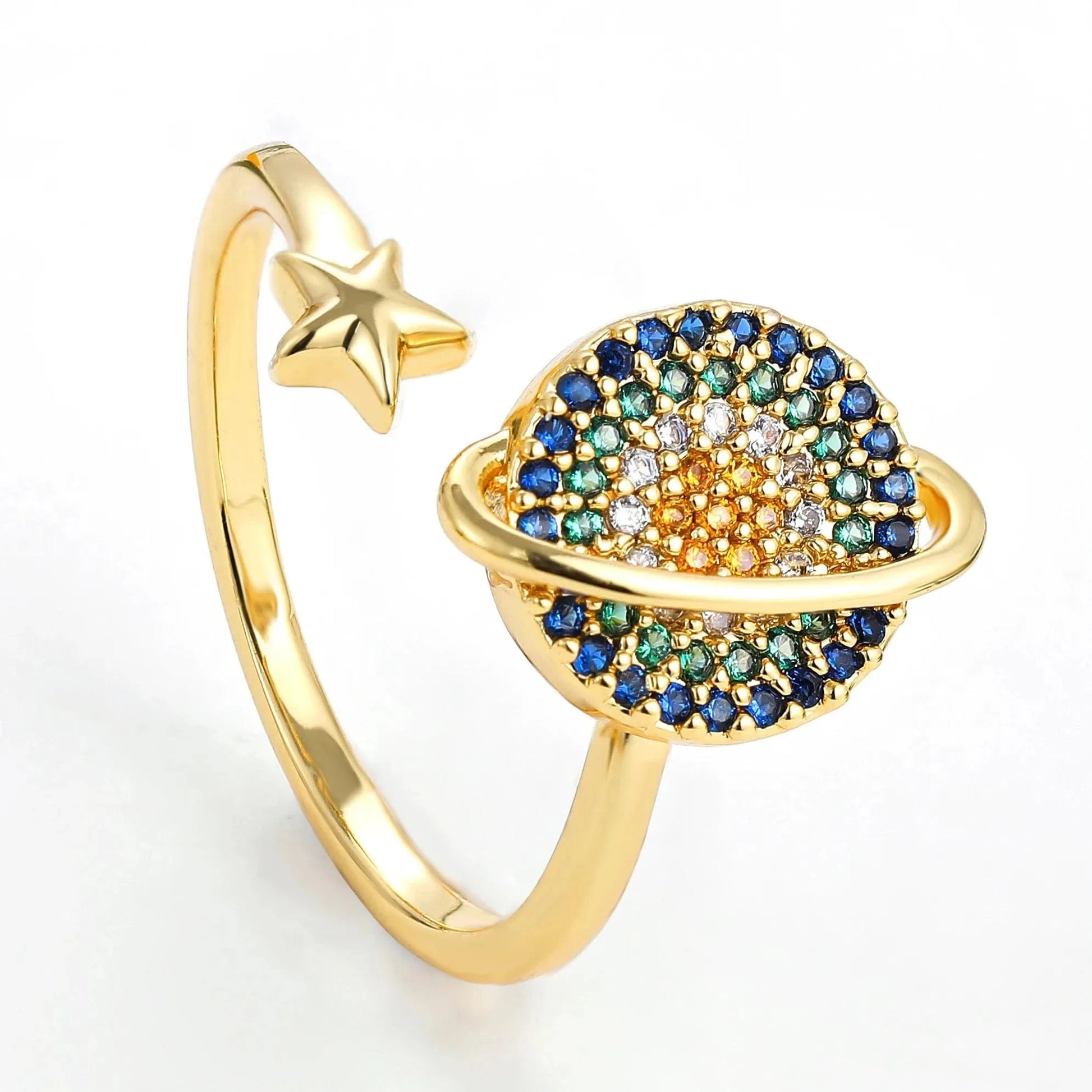 Gold ring with colorful gemstones on a white background