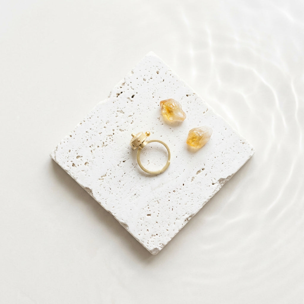 Gold-plated prayer wheel spinner ring seen from above, spinning band and side bead