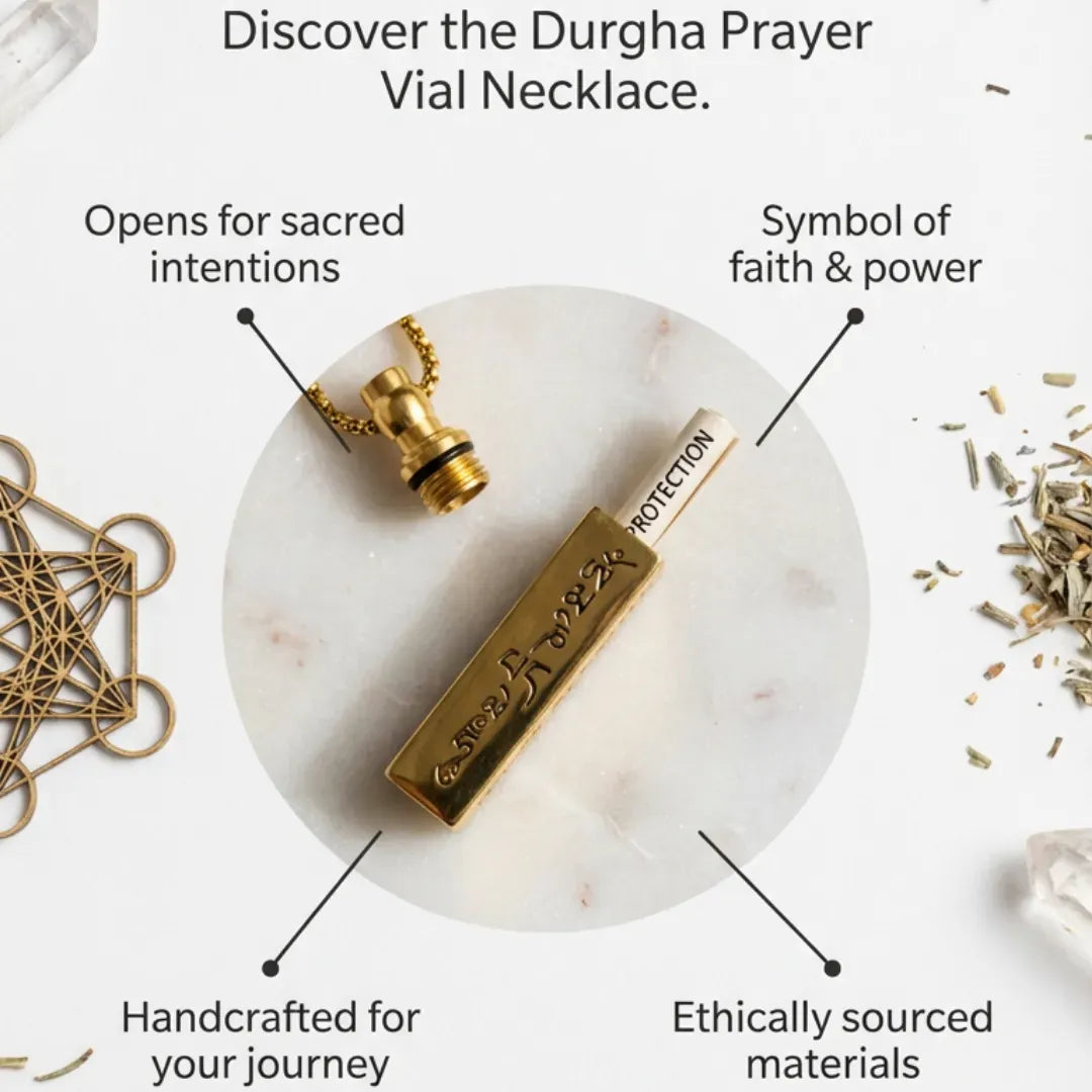 Gold pendant necklace on a marble surface with text describing its features.