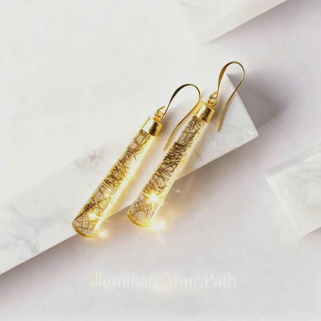 Load video: light background with text illuminate your path with gold earrings