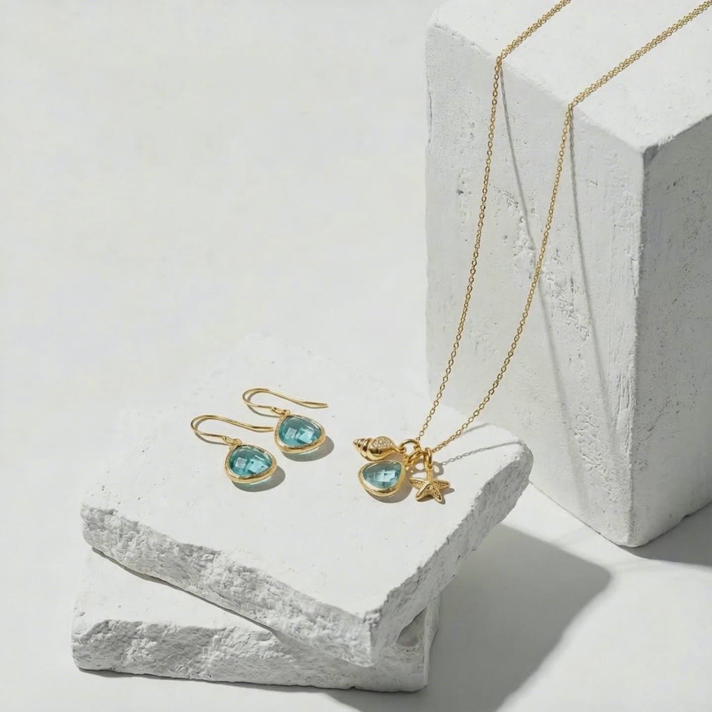 Load video: aqua mini drop earrings and necklace with shell starfish