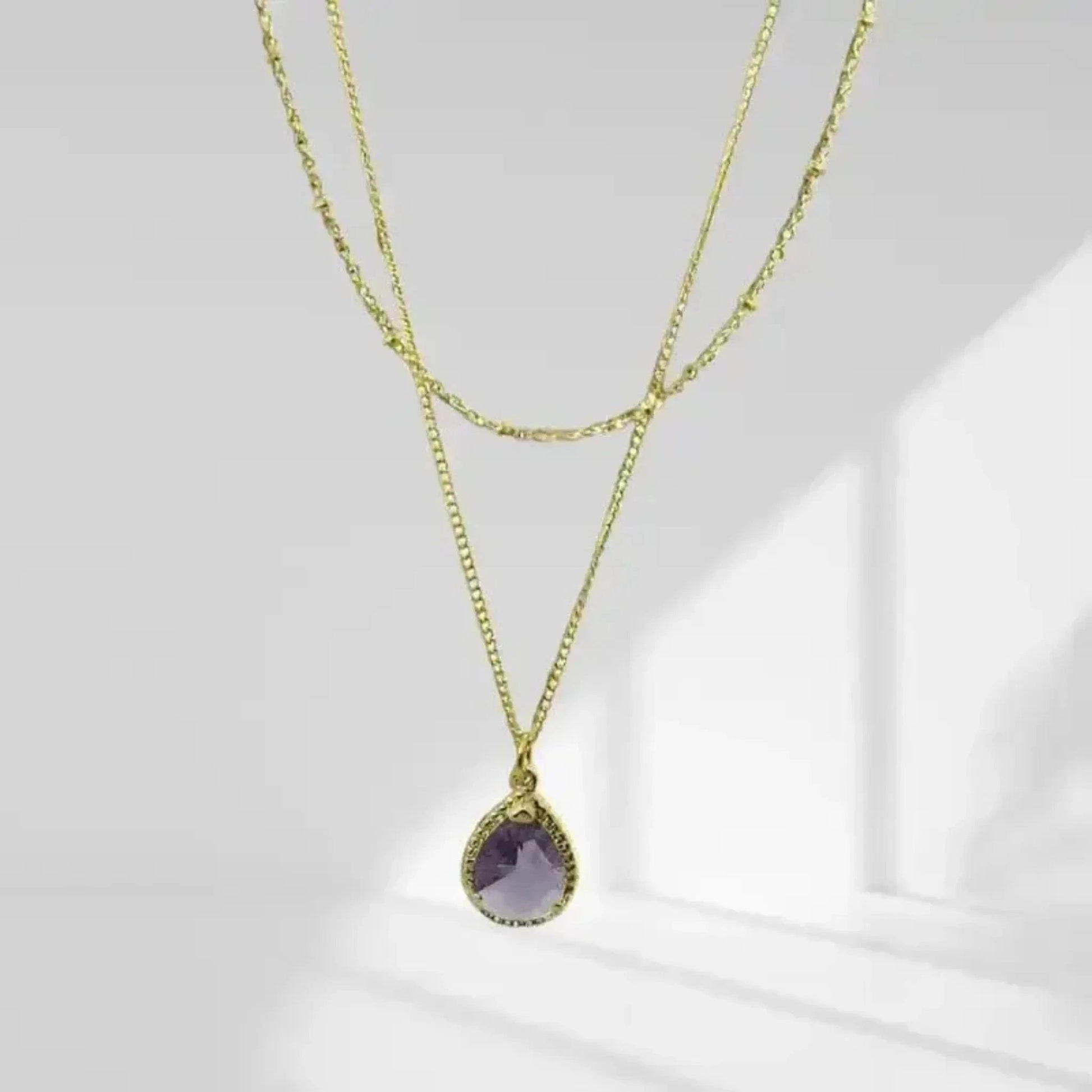 purple gold necklace