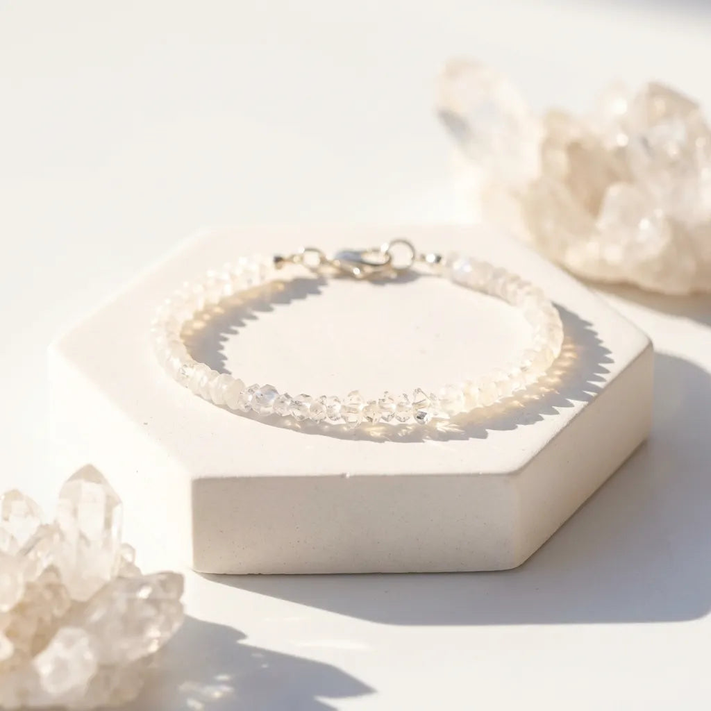bracelet in a hexagonal box with a soft white background