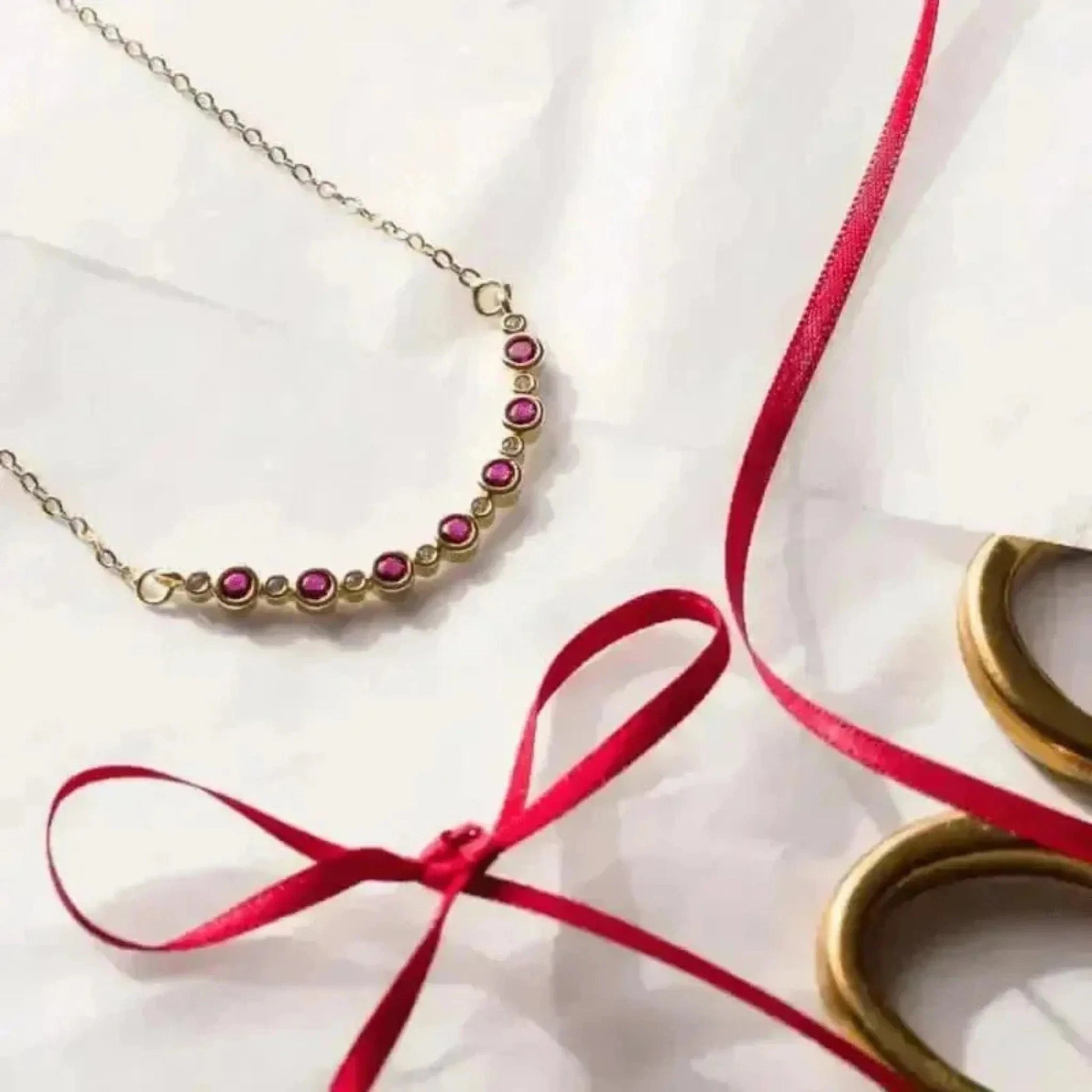 red glass gold necklace
