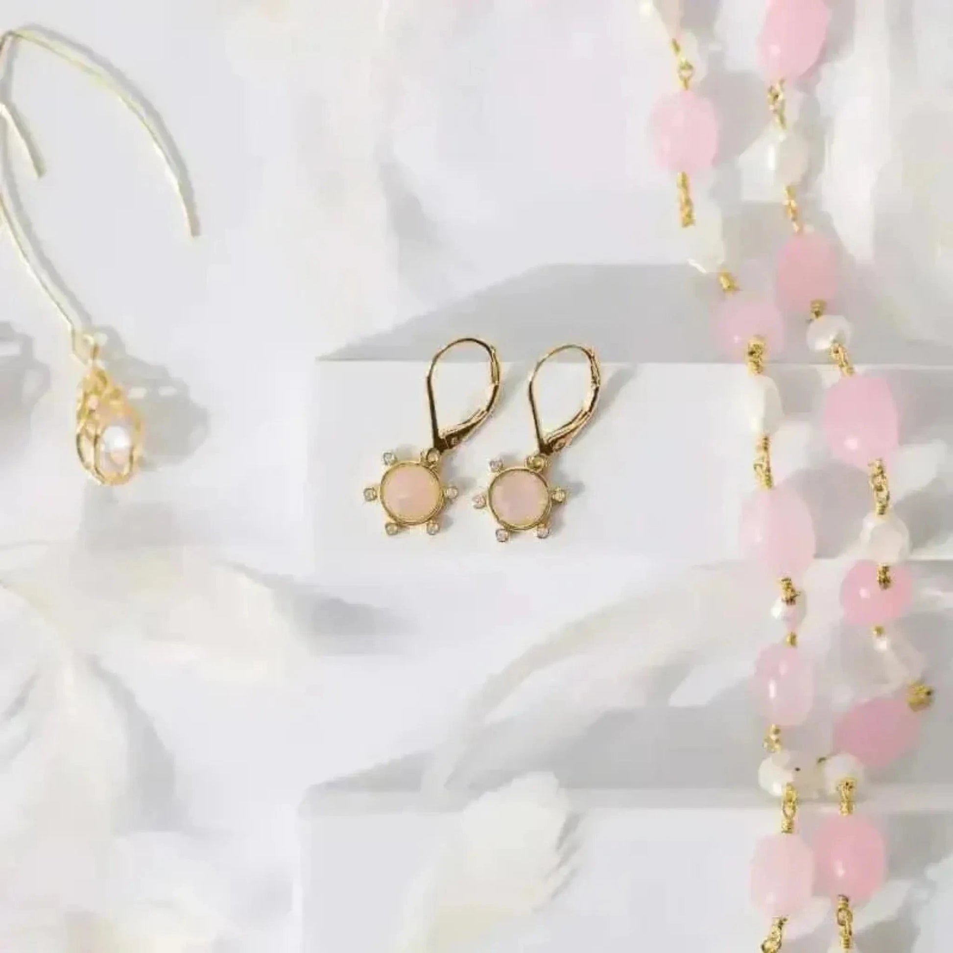 pink dainty earrings in gold