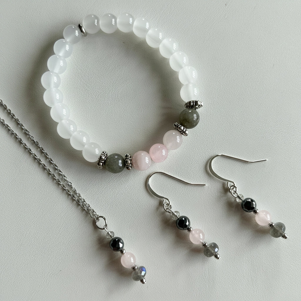 Rose quartz and pyrite necklace with matching earrings and selenite bracelet styled as a complete everyday set